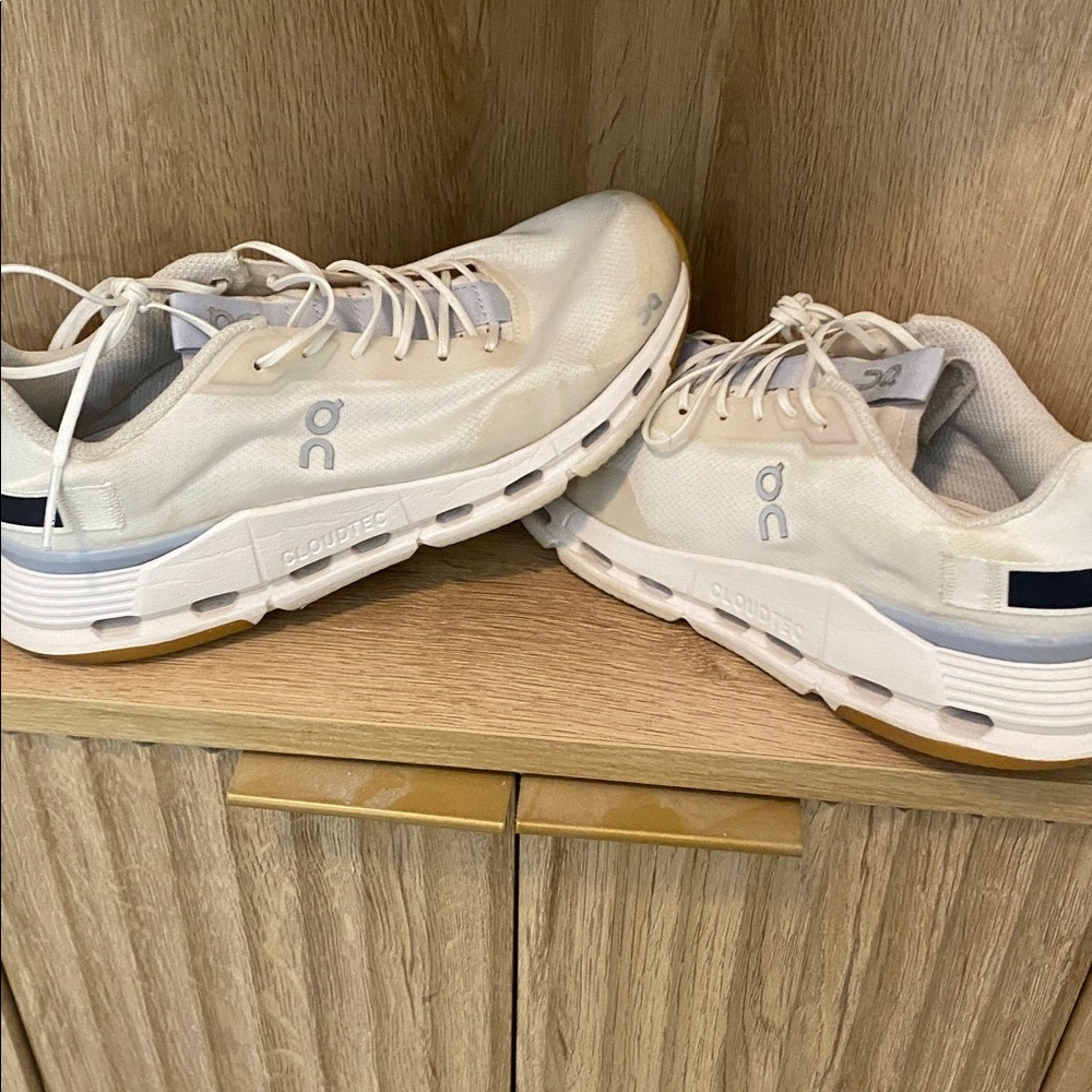 On Running Cream and White Sneakers